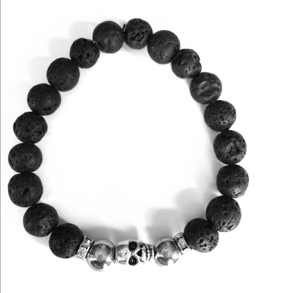 Natural stones. Lava bead & silver skull accents